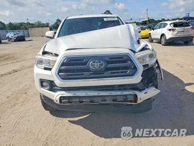 Piąte zdjęcie samochodu w środku: 2019 TOYOTA TACOMA SR5 V6 VIN:3TMCZ5AN0KM210530 - miniatura