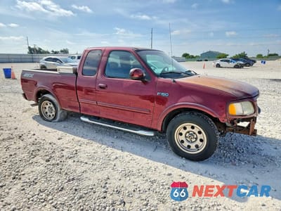 Czwarte zdjęcie samochodu z boku: 2003 FORD F150 VIN:2FTRX17213CA88635 - miniatura