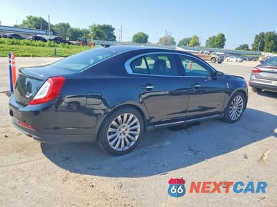 Trzecie zdjęcie samochodu z tyłu: 2013 LINCOLN MKS VIN:1LNHL9EK7DG604582 - miniatura