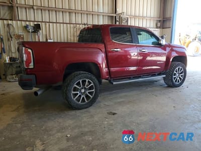 Trzecie zdjęcie samochodu z tyłu: 2018 GMC CANYON DENALI VIN:1GTP6EE18J1211390 - miniatura