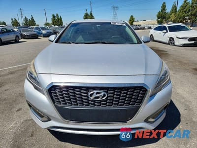 Piąte zdjęcie samochodu w środku: 2016 HYUNDAI SONATA HYBRID SE VIN:KMHE24L14GA040352 - miniatura