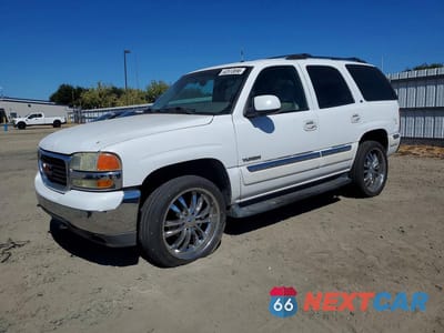 2002 GMC YUKON 1GKEC13T42R131783 - główne zdjęcie licytacji z USA - miniatura