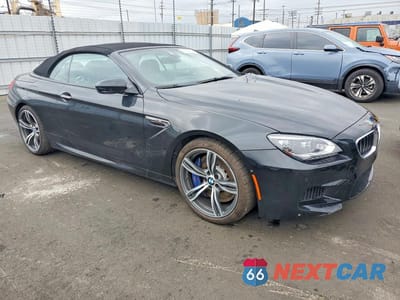 Czwarte zdjęcie samochodu z boku: 2013 BMW M6 VIN:WBSLZ9C55DDZ78127 - miniatura