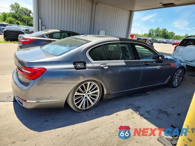 Trzecie zdjęcie samochodu z tyłu: 2016 BMW 750 XI VIN:WBA7F2C57GGE12322 - miniatura