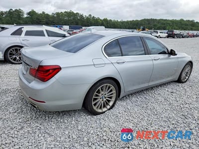 Trzecie zdjęcie samochodu z tyłu: 2013 BMW 750 I VIN:WBAYA8C55DD228027 - miniatura