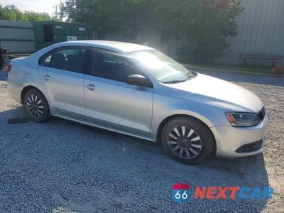 Czwarte zdjęcie samochodu z boku: 2011 VOLKSWAGEN JETTA BASE VIN:3VW2K7AJ1BM395743 - miniatura