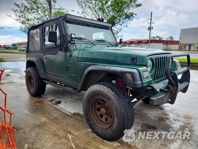 Czwarte zdjęcie samochodu z boku: 2000 JEEP WRANGLER / TJ SPORT VIN:1J4FA49S6YP724694 - miniatura