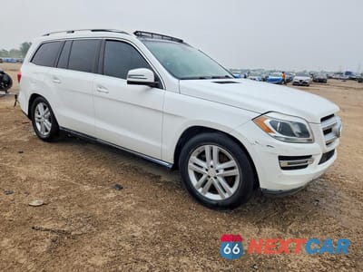 Czwarte zdjęcie samochodu z boku: 2016 MERCEDES-BENZ GL 450 4MATIC VIN:4JGDF6EE6GA675598 - miniatura