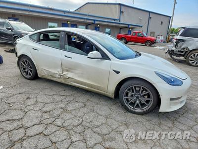 Czwarte zdjęcie samochodu z boku: 2021 TESLA MODEL 3 VIN:5YJ3E1EB9MF923664 - miniatura