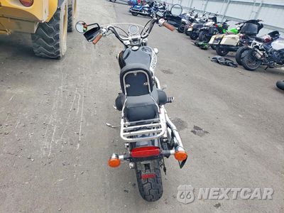 Czwarte zdjęcie samochodu z boku: 2000 HONDA VT1100 C VIN:1HFSC1816YA400045 - miniatura