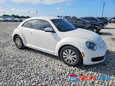 Czwarte zdjęcie samochodu z boku: 2012 VOLKSWAGEN BEETLE VIN:3VWJX7AT1CM648639 - miniatura
