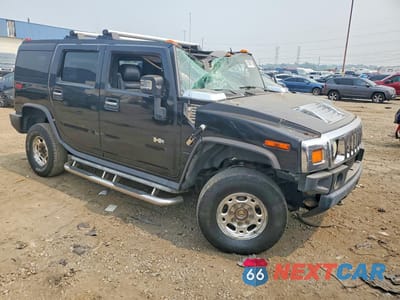 Czwarte zdjęcie samochodu z boku: 2006 HUMMER H2 VIN:5GRGN23UX6H122495 - miniatura