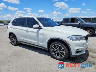 Czwarte zdjęcie samochodu z boku: 2017 BMW X5 XDR40E VIN:5UXKT0C30H0S80843 - miniatura