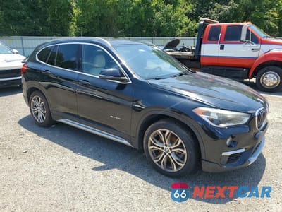 Czwarte zdjęcie samochodu z boku: 2016 BMW X1 XDRIVE28I VIN:WBXHT3Z37G4A50895 - miniatura