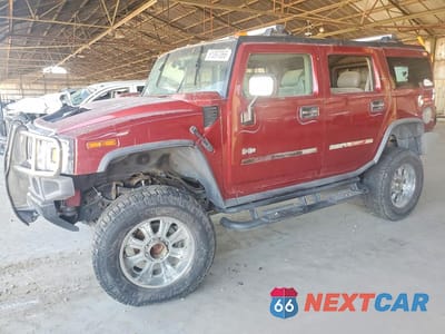 2003 HUMMER H2 5GRGN23U83H144409 - główne zdjęcie licytacji z USA - miniatura