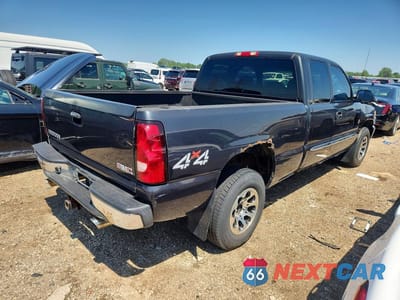 Trzecie zdjęcie samochodu z tyłu: 2003 GMC NEW SIERRA K1500 VIN:1GTEK19T23E254285 - miniatura