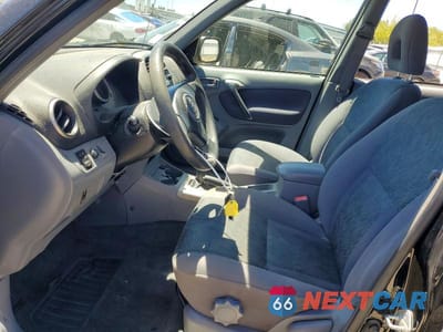 Zdjęcie 7 z 13 samochodu: 2001 TOYOTA RAV4 BASE VIN:JTEGH20V710033797 - miniatura