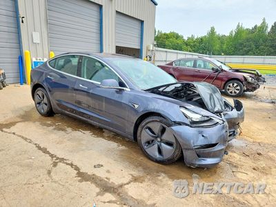 Czwarte zdjęcie samochodu z boku: 2018 TESLA MODEL 3 VIN:5YJ3E1EB4JF113967 - miniatura