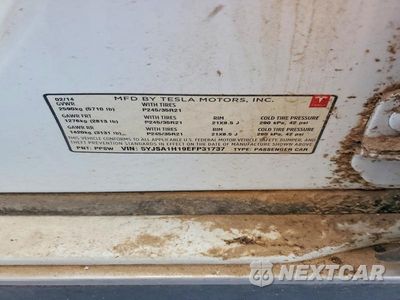Zdjęcie 12 z 12 samochodu: 2014 TESLA MODEL S VIN:5YJSA1H19EFP31737 - miniatura