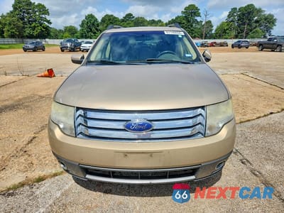 Piąte zdjęcie samochodu w środku: 2008 FORD TAURUS X SEL VIN:1FMDK05W28GA00735 - miniatura