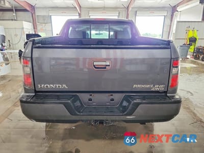 Zdjęcie 6 z 13 samochodu: 2013 HONDA RIDGELINE RTL VIN:5FPYK1F5XDB002603 - miniatura