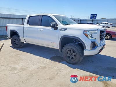 Czwarte zdjęcie samochodu z boku: 2021 GMC SIERRA K1500 AT4 VIN:3GTU9EETXMG324484 - miniatura