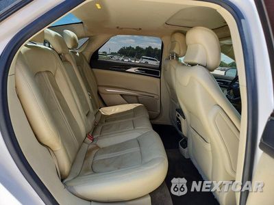 Zdjęcie 10 z 12 samochodu: 2015 LINCOLN MKZ VIN:3LN6L2GK6FR624183 - miniatura