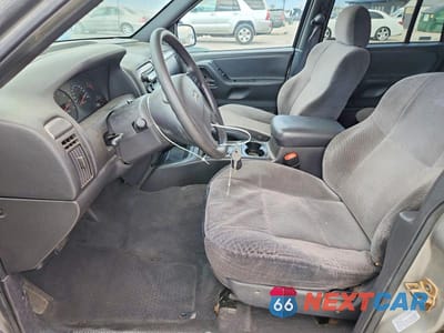 Zdjęcie 7 z 12 samochodu: 2001 JEEP GRAND CHEROKEE LAREDO VIN:1J4GW48S51C599854 - miniatura