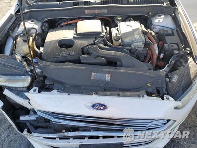 Zdjęcie 11 z 12 samochodu: 2016 FORD FUSION TITANIUM PHEV VIN:3FA6P0SU3GR320497 - miniatura