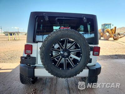 Zdjęcie 6 z 13 samochodu: 2018 JEEP WRANGLER UNLIMITED SAHARA VIN:1C4HJWEG9JL872993 - miniatura