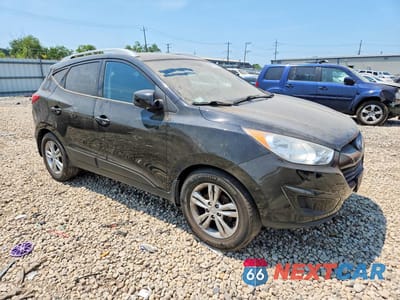 Czwarte zdjęcie samochodu z boku: 2011 HYUNDAI TUCSON GLS VIN:KM8JU3AC4BU170369 - miniatura