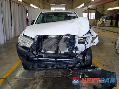 Piąte zdjęcie samochodu w środku: 2021 TOYOTA TACOMA SR VIN:3TYRX5GN5MT014825 - miniatura