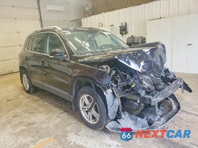 Czwarte zdjęcie samochodu z boku: 2011 VOLKSWAGEN TIGUAN S VIN:WVGBV7AX9BW532180 - miniatura