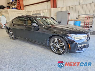 Czwarte zdjęcie samochodu z boku: 2019 BMW 750 XI VIN:WBA7F2C50KB239746 - miniatura