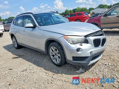 Czwarte zdjęcie samochodu z boku: 2014 BMW X1 XDRIVE28I VIN:WBAVL1C58EVY17136 - miniatura