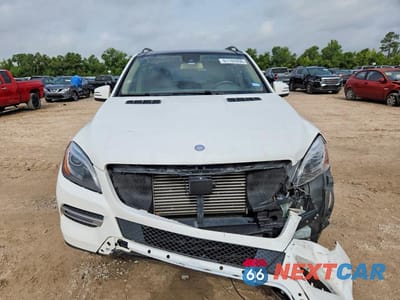 Piąte zdjęcie samochodu w środku: 2015 MERCEDES-BENZ ML 250 BLUETEC VIN:4JGDA0EBXFA585712 - miniatura