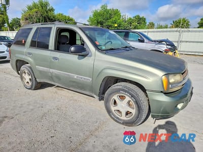 Czwarte zdjęcie samochodu z boku: 2004 CHEVROLET TRAILBLAZER LS VIN:1GNDS13S142396083 - miniatura