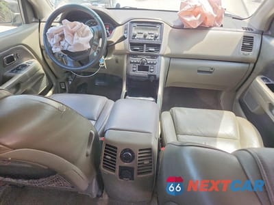 Zdjęcie 8 z 13 samochodu: 2007 HONDA PILOT EXL VIN:5FNYF18577B033001 - miniatura