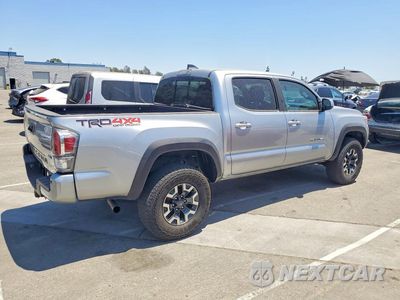 Trzecie zdjęcie samochodu z tyłu: 2023 TOYOTA TACOMA DOUBLE CAB VIN:3TMCZ5AN0PM64740X - miniatura