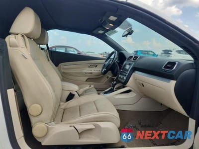 Zdjęcie 10 z 12 samochodu: 2013 VOLKSWAGEN EOS KOMFORT VIN:WVWBW8AH5DV006413 - miniatura