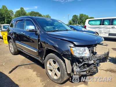 Czwarte zdjęcie samochodu z boku: 2013 JEEP GRAND CHEROKEE LIMITED VIN:1C4RJFBT9DC597605 - miniatura