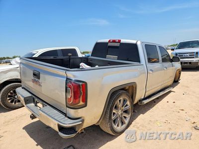 Trzecie zdjęcie samochodu z tyłu: 2018 GMC SIERRA K1500 SLT VIN:3GTU2NEC8JG543606 - miniatura