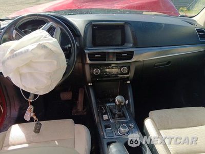Zdjęcie 8 z 12 samochodu: 2016 MAZDA CX-5 GT VIN:JM3KE4DY1G0663693 - miniatura