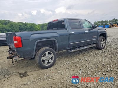 Trzecie zdjęcie samochodu z tyłu: 2017 GMC SIERRA K2500 SLT VIN:1GT12TEG5HF128670 - miniatura