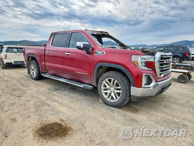 Czwarte zdjęcie samochodu z boku: 2020 GMC SIERRA K1500 SLT VIN:1GTU9DET1LZ231135 - miniatura