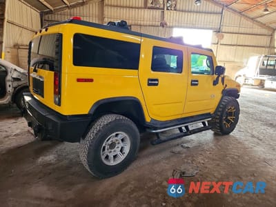Trzecie zdjęcie samochodu z tyłu: 2004 HUMMER H2 VIN:5GRGN23U14H121832 - miniatura