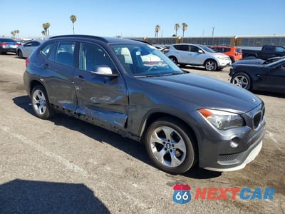 Czwarte zdjęcie samochodu z boku: 2015 BMW X1 SDRIVE28I VIN:WBAVM1C50FV317017 - miniatura