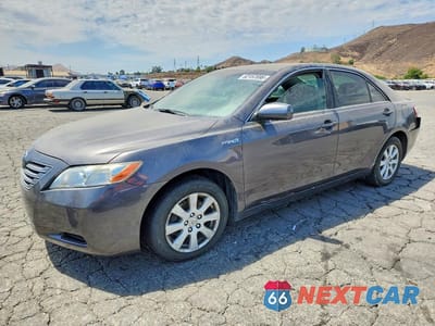 2007 TOYOTA CAMRY HYBRID JTNBB46K873020455 - główne zdjęcie licytacji z USA - miniatura