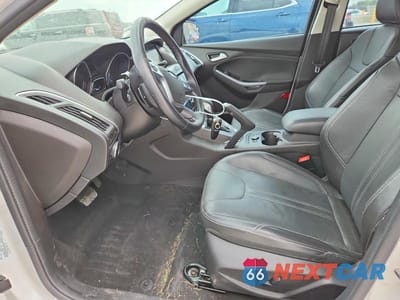 Zdjęcie 7 z 12 samochodu: 2014 FORD FOCUS TITANIUM VIN:1FADP3N27EL439510 - miniatura