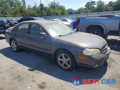 Czwarte zdjęcie samochodu z boku: 2000 NISSAN MAXIMA GXE VIN:JN1CA31D3YT740569 - miniatura